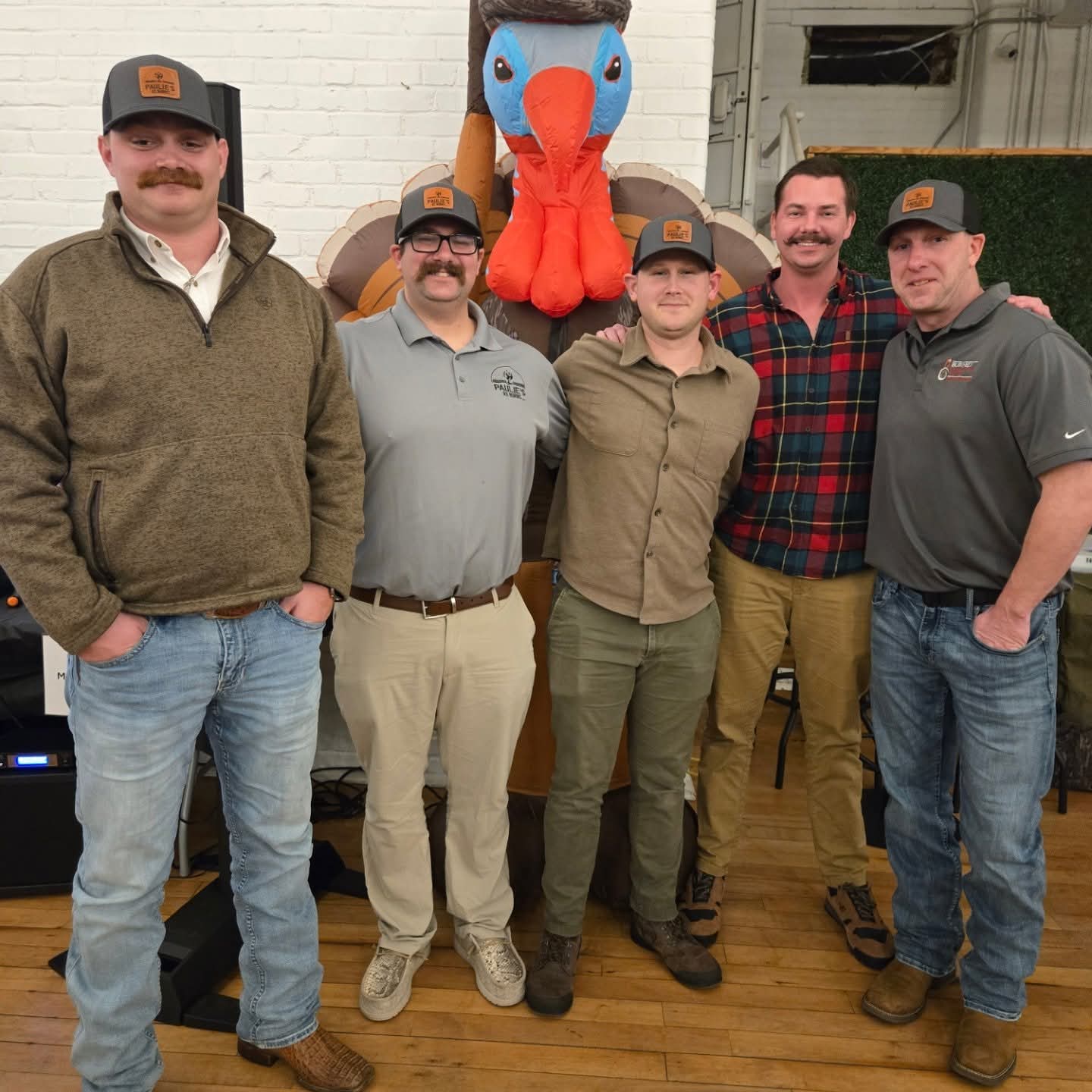 Three accompaniments of an outdoor fire. The pieces of wood appear part-cylinder in cross-section and are scored in lines ...